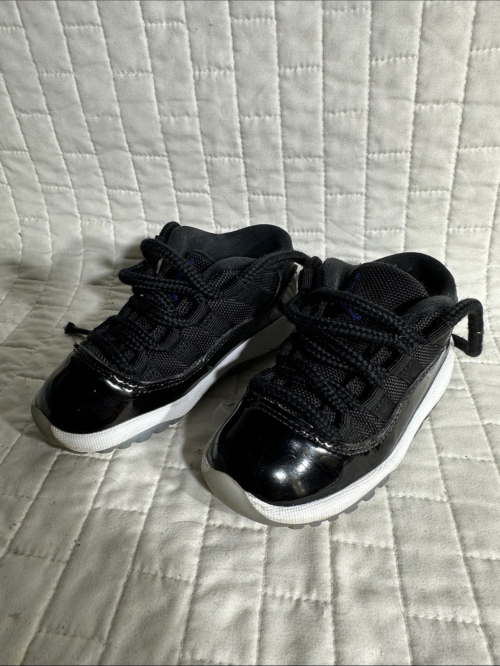Nike Air Jordan 11 Retro sneaker in a black colorway